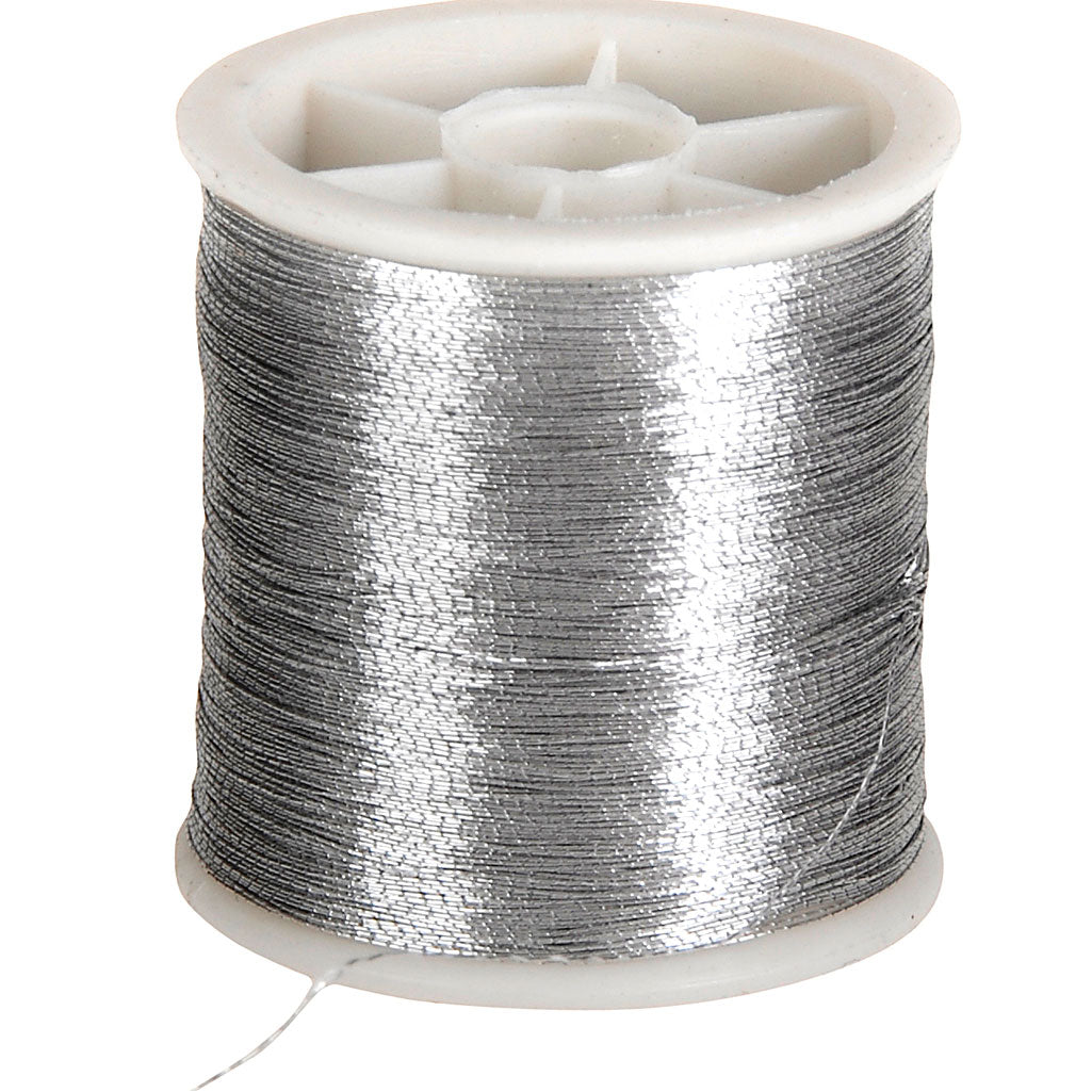 https: www.cchobby.nl naaigaren-dikte-0-15-mm-zilver-100-m-1-rol