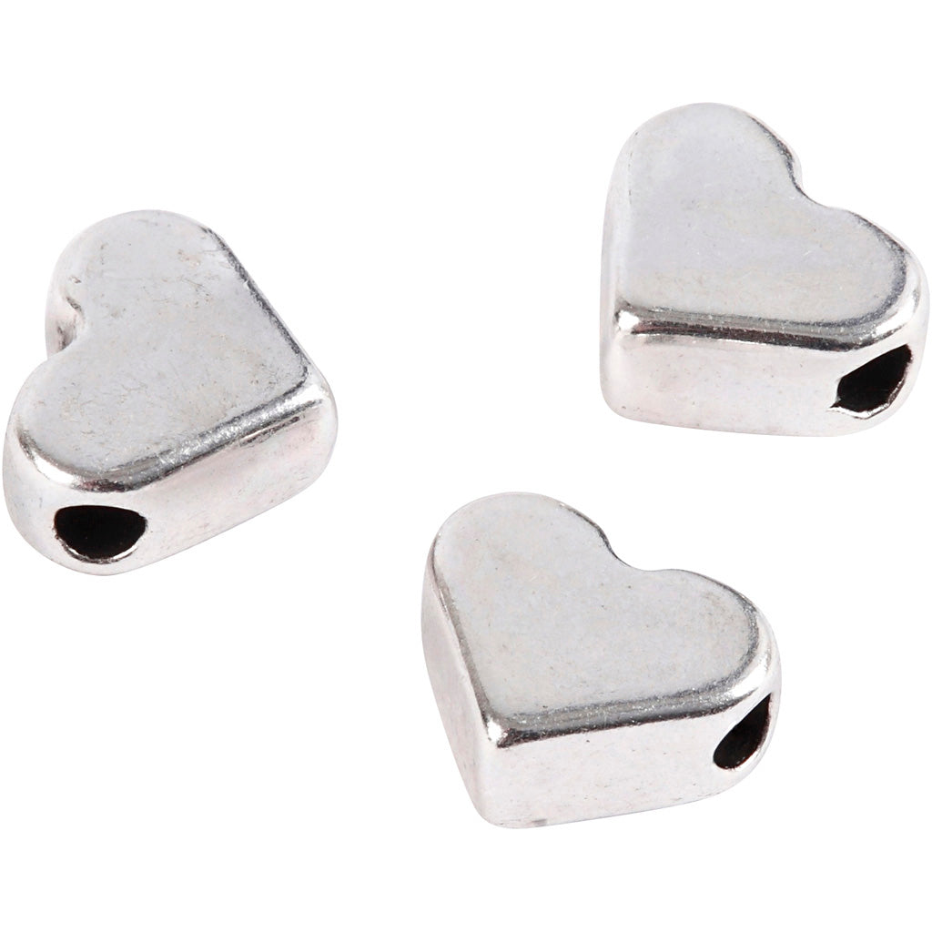 Creativ Company Https: www.cchobby.nl space-kralen-afm-5-5x7-mm-gatgrootte-1-mm-verzilverd-3-stuk-1-doos