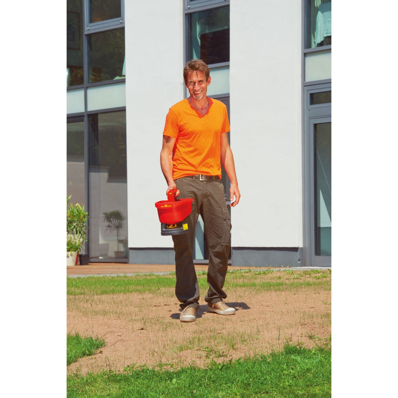 WOLF-Garten we-b universele handstrooier strooiapparatuur (rood geel)
